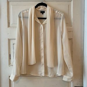 Cream, sheer blouse with neck tie